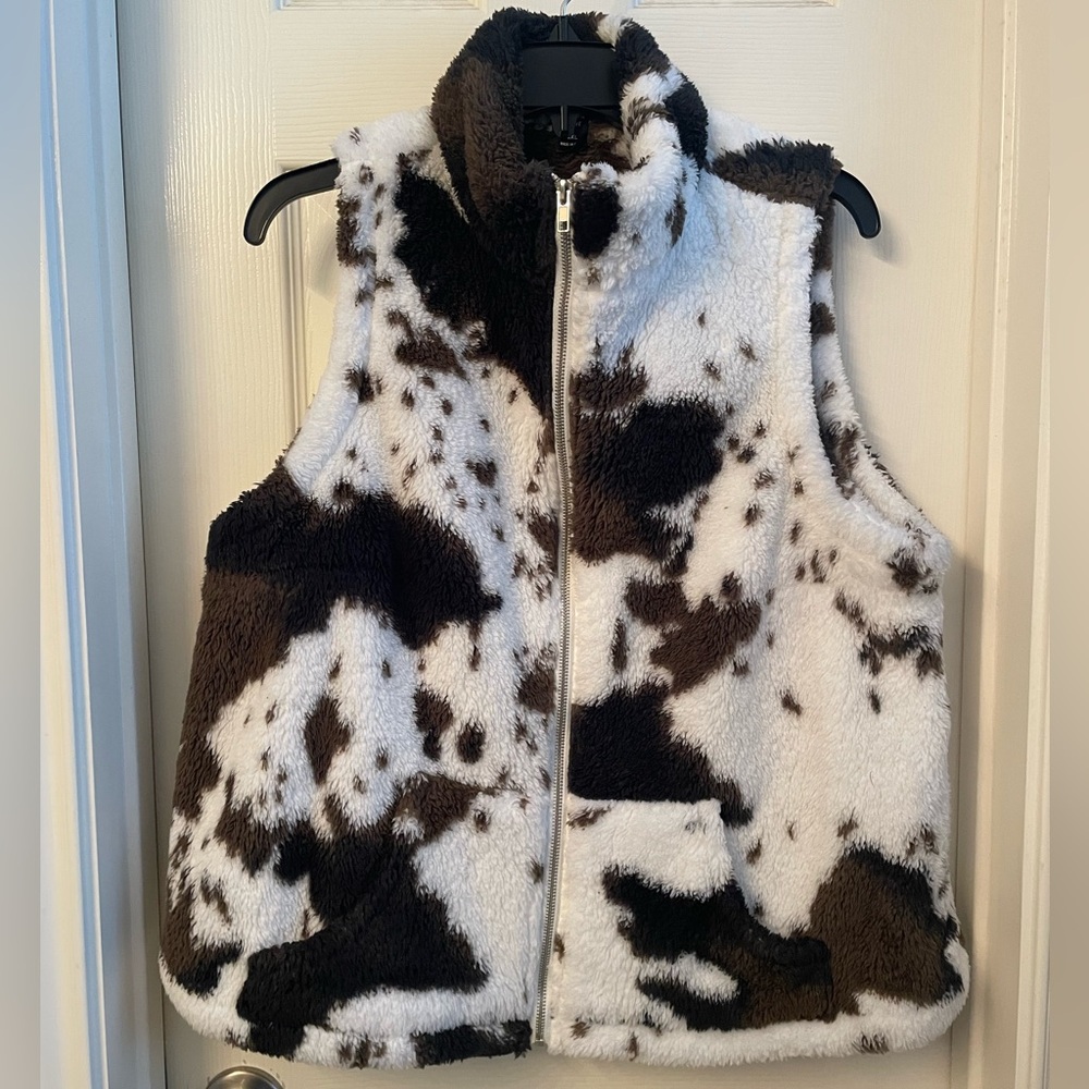 Cow print fuzzy vest.  XL
